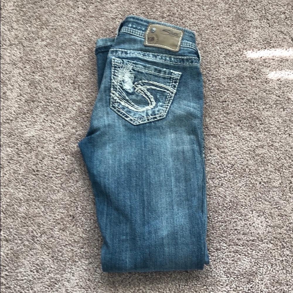 Silver jeans.